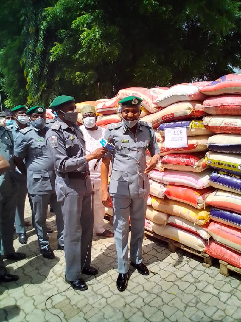Nasir Ahmad Comptroller Jigawa Kano Command,Displaying Smuggled Rice