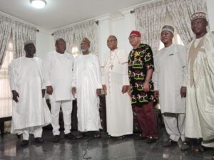 Senate Yerima in a group photograph with Onaiyekan 