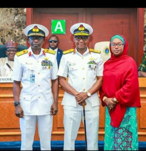 Rear Admiral Chindo Yahya Usman middle after his decoration